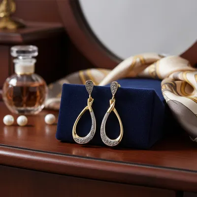 Brinco Gota  Cravejado com  Zircônias