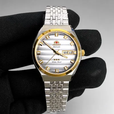 Relógio Orient 3 estrelas heritage misto aço e ouro automático 
