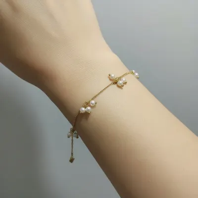 Pulseira Dourada com Pérolas
