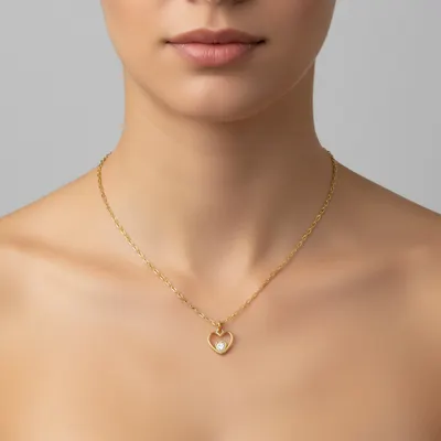 Colar corrente Cartier com pingente coração com ponto de luz 